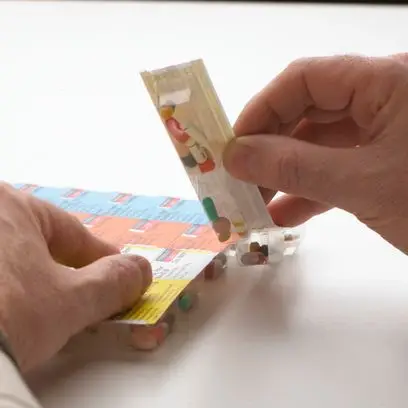 Multi-dose medication packaging organized by day and time
